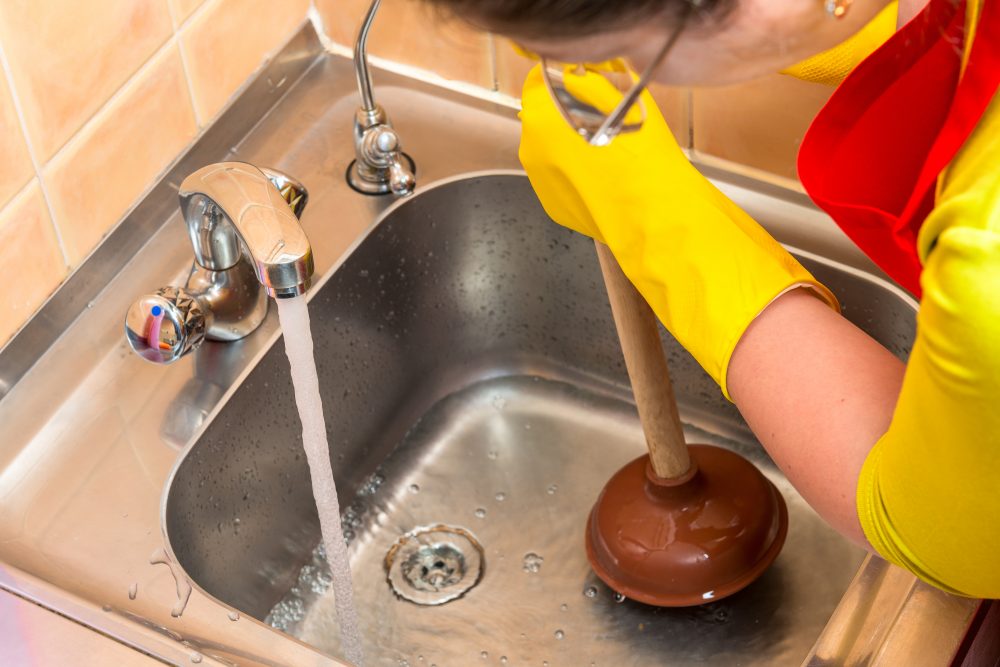 diy unclogging your kitchen sink